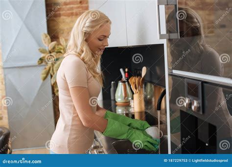 Young Housewife In Rubber Gloves Washing Stock Image Image Of