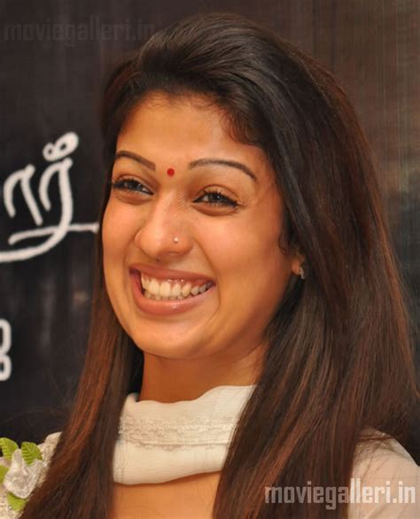 test nayantara face expressions at aadhavan 100 days celebration photo