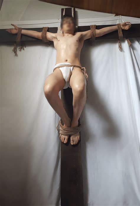 men hard labour naked crucifixion