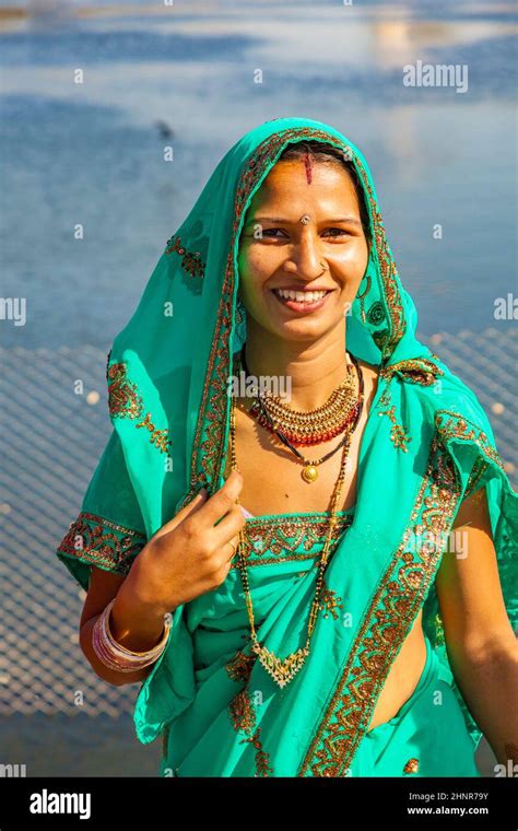portrait of indian girl in colorful ethnic attire at sagar lake in