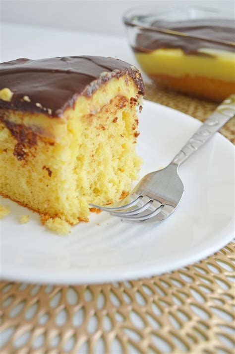 this boston cream poke cake turns your favorite donut into a cake