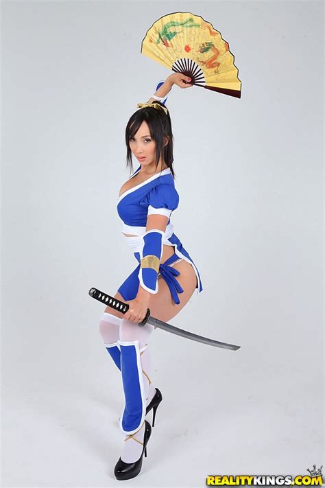 Cosplay Photo Session Of Asian Model With Big Boobs Samurai S Saber