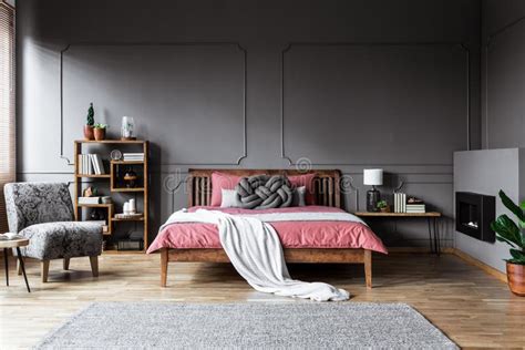 spacious grey bedroom interior stock photo image  apartment fireplace