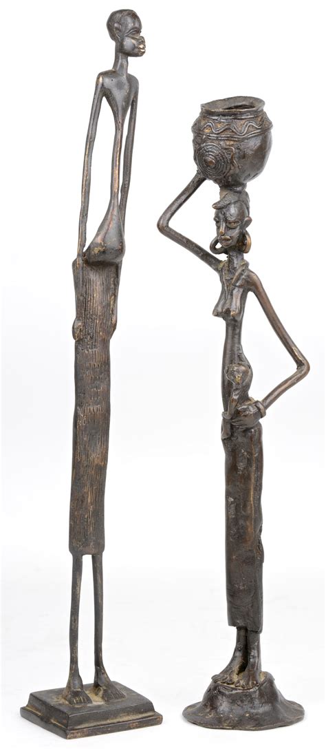 een paar langgerekte personages van afrikaans brons jordaens nv veilinghuis
