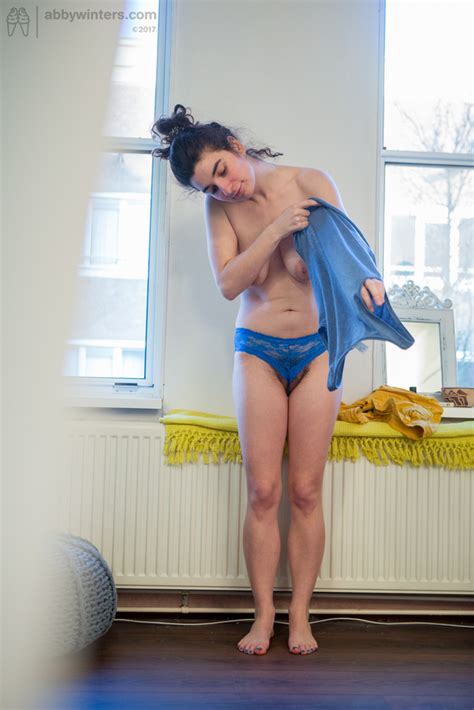 nude amateur livia v is secretly filmed getting dressed by a hidden camera