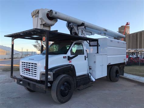 gmc  forestry bucket truck tree trimming chipper bed  foot  miles   gmc