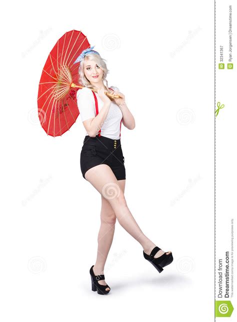 Young Beautiful Pin Up Woman Posing With Umbrella Royalty Free Stock