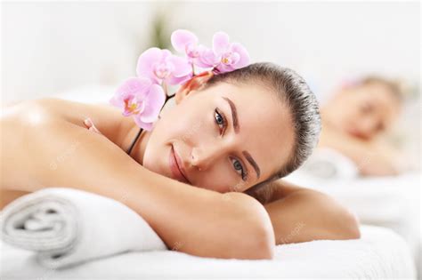 Premium Photo Two Beautiful Women Getting Massage In Spa