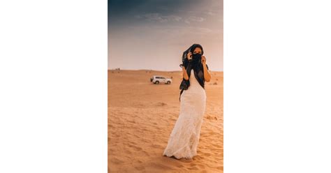 dubai united arab emirates bride wears wedding dress in 33 countries on honeymoon popsugar