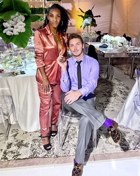 unwnt‘s crystal dunn and her husband pierre soubrier pose for a photo