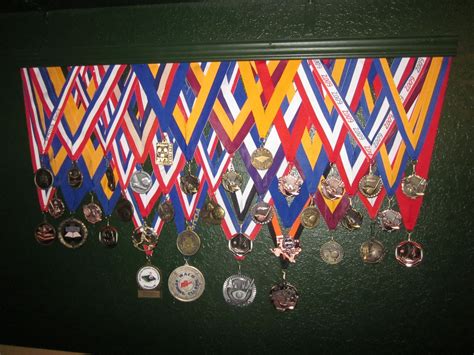 good   hang medals cut ribbons  correct length  staple