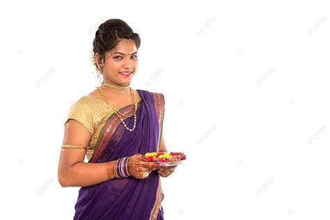 Indian Girl Holding Pooja Thali And Diya For Diwali On White Background