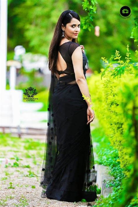 tv anchor anasuya hot navel photos in black saree tollywood stars