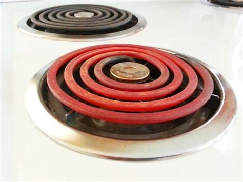 clean heating coils   electric stove  easy steps