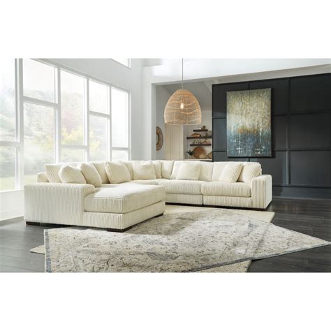 lindyn ivory pc chaise sectional   signature design  ashley  smith home furnishings