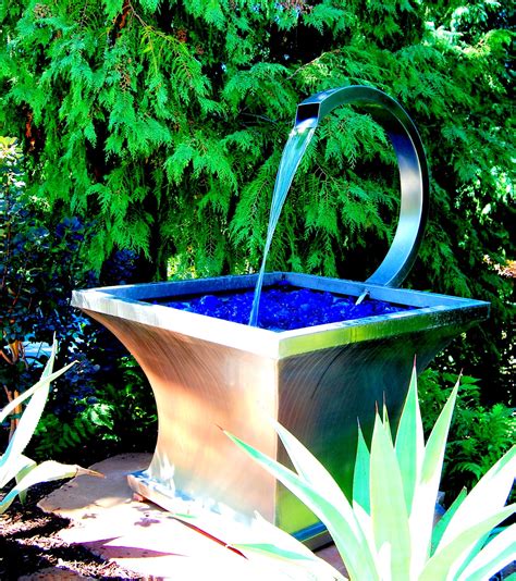 stainless steel water fountain modern landscaping front yard plants garden elements
