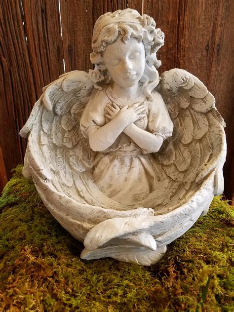 stone wing angel statue local delivery   belleville il eckert florist