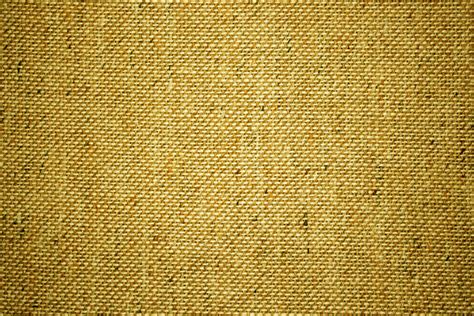 golden yellow upholstery fabric close  texture picture