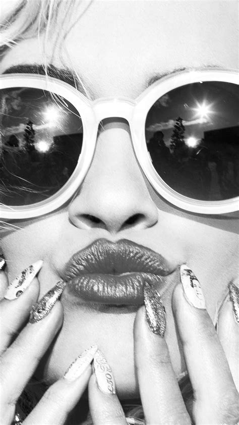black and white portrait of blonde model in fashion sunglasses