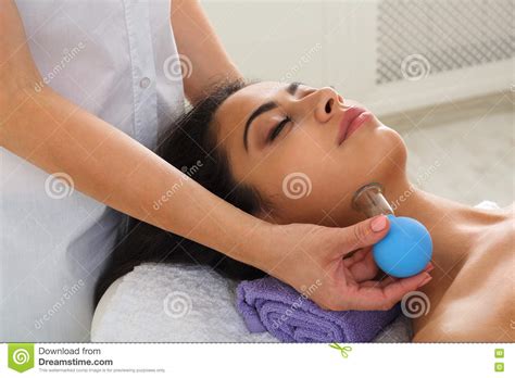 woman has vacuum massage in ayurveda spa wellness center stock image