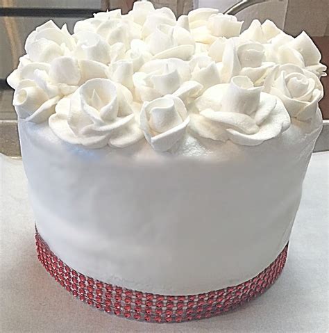 wedding cake layer white buttercream frosting  royal icing roses