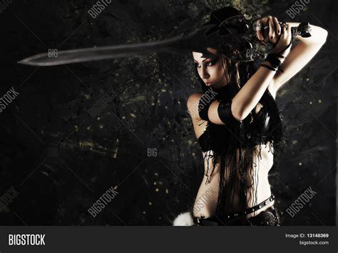 Beautiful Female Fighter Sword Her Image And Photo Bigstock