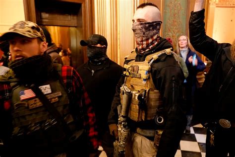 armed michigan protest at state capitol amid lockdown vote