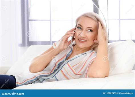 Mature Woman Talking On Mobile Phone Stock Image Image Of Sitting