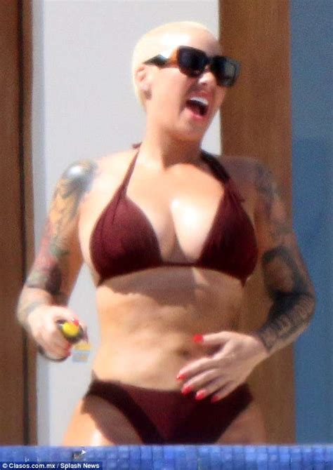 Amber Rose Flaunts Curves In Skimpy Bikini During Mexico Holiday