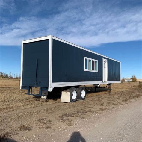 eco friendly converted semi trailer tiny home  shockingly modern