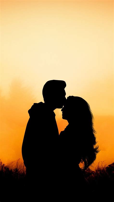 couple hug kiss love outdoor sunset 720x1280 wallpaper wallpaper couples love photos