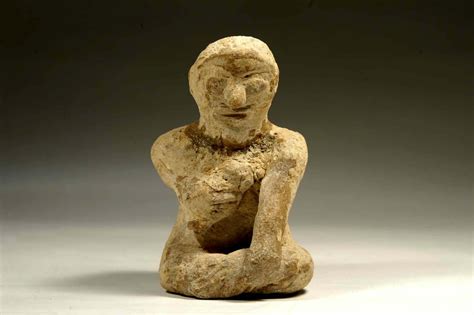 phoenician figure   seated worshiper phoenician