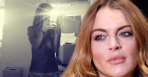 lindsay lohan teases fans with topless selfie mirror online