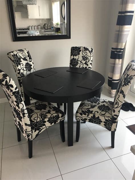 ikea bjursta extending  blackbrown table   chairs