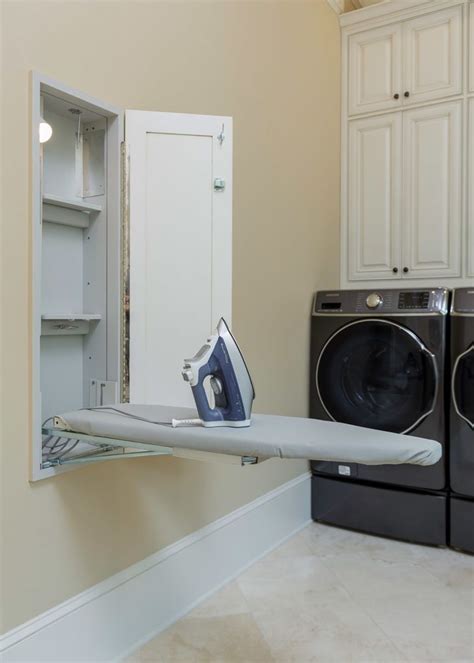 highpoint hidden ironing board laundry room design small laundry rooms house  home magazine