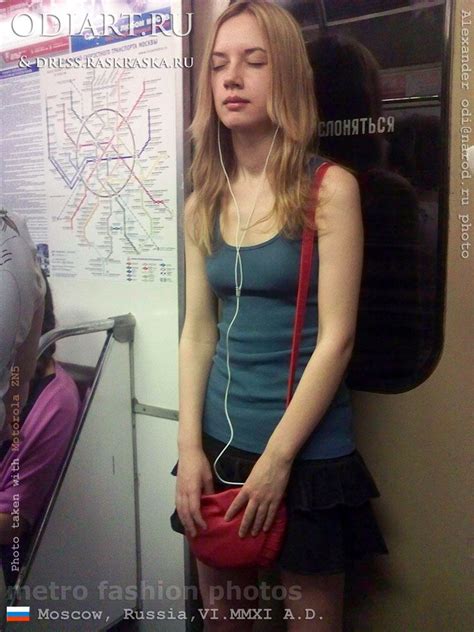 russian blonde girl black mini skirt photo from moscow subway girl with headphones little