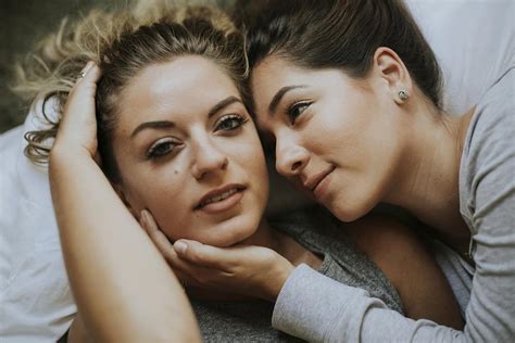 lesbian couple together in bed premium photo rawpixel