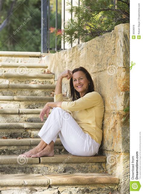Relaxed Smiling Mature Woman Outdoor Royalty Free Stock