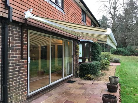 large electric awning fitted  patio doors  petersfield awningsouth
