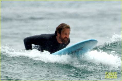 full sized photo of gerard butler surfing wetsuit 27 photo 4463679