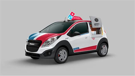 dominos rolls   pizza delivery car