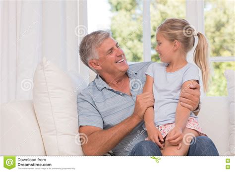 Girl Smiling With Grandfather Stock Image Image Of Person People