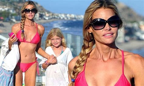 denise richards shows off bikini body whilst hitting beach with daughter lola daily mail online