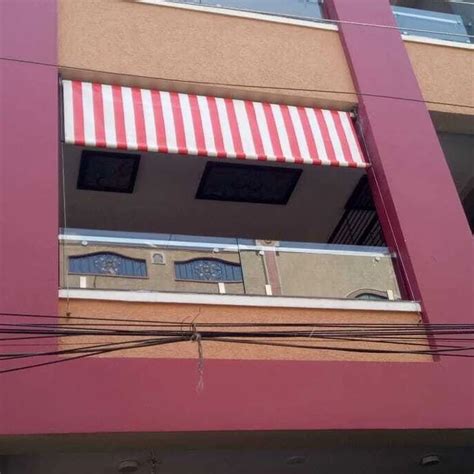 rectangular red  white vertical retractable awning  home  rs sq ft  hyderabad