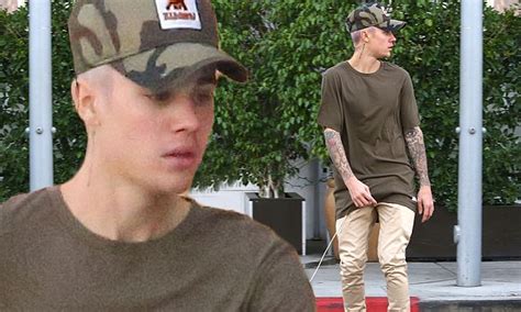 Justin Bieber Takes To His Skateboard With His New Purple