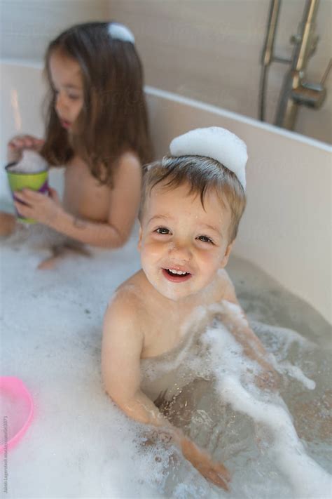 cute boy toddler playing   bathtub  jakob lagerstedt