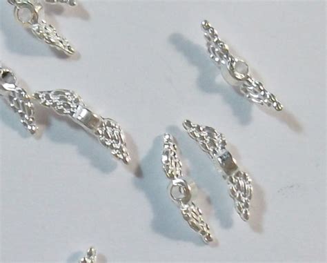 ala metallo perle angelo ala perle 12mm tibet argento realizzerà 10stk m440 ebay
