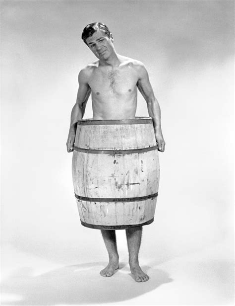 1960s Naked Man Wearing A Wooden Barrel Around Midsection With Look Of