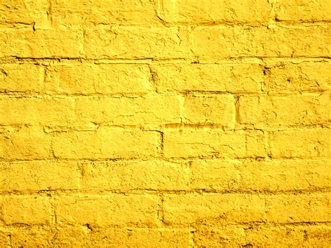 yellow painted brick wall  stock photo public domain pictures