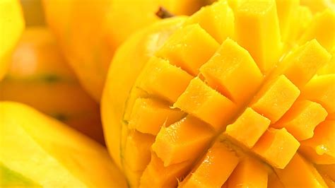 close  mango fruit  mango cubes macro photography texture